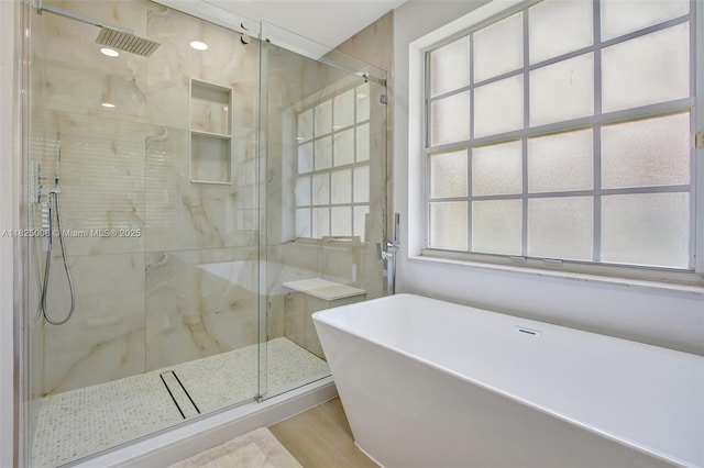 676 NW 133rd Dr, Plantation, FL 33325 - full bath featuring a freestanding bath, a marble finish shower, and wood finished floors