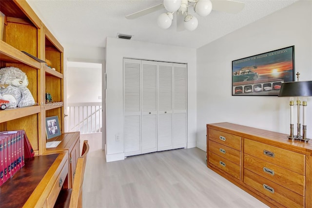 676 NW 133rd Dr, Plantation, FL 33325 - bedroom with light wood-type flooring, a closet, and a ceiling fan