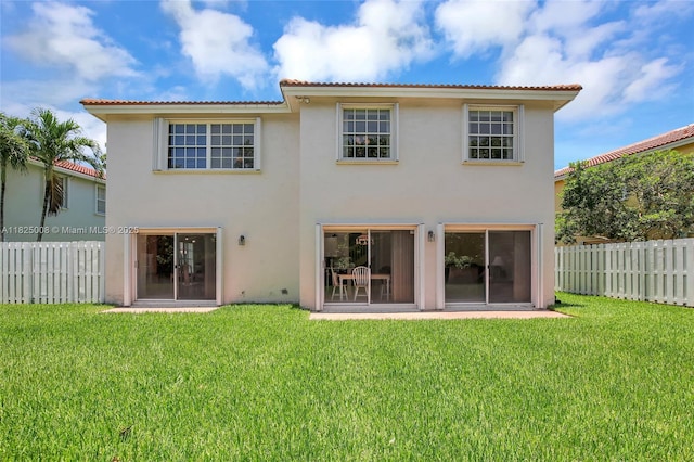676 NW 133rd Dr, Plantation, FL 33325 - rear view of property featuring stucco siding and a tiled roof