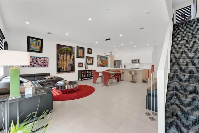 4212 NE 7th Ter, Oakland Park, FL 33334 - living area with recessed lighting and light tile patterned floors