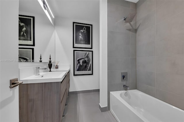 4212 NE 7th Ter, Oakland Park, FL 33334 - bathroom with vanity, shower / washtub combination, and tile patterned floors