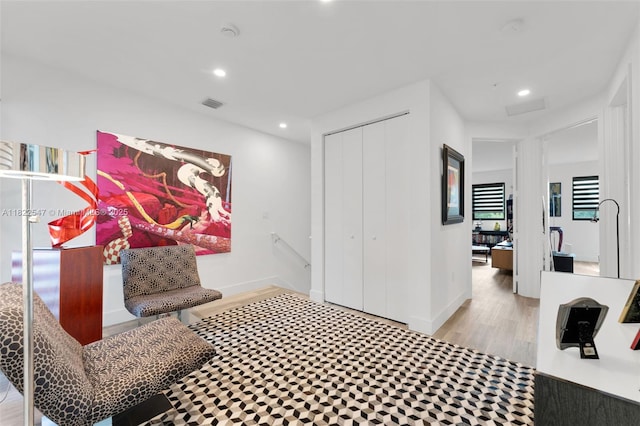 4212 NE 7th Ter, Oakland Park, FL 33334 - sitting room with recessed lighting, an upstairs landing, and wood finished floors