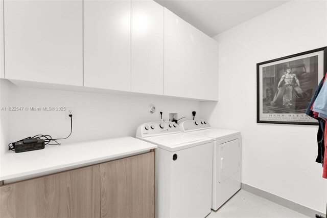 4212 NE 7th Ter, Oakland Park, FL 33334 - laundry area with cabinet space and independent washer and dryer