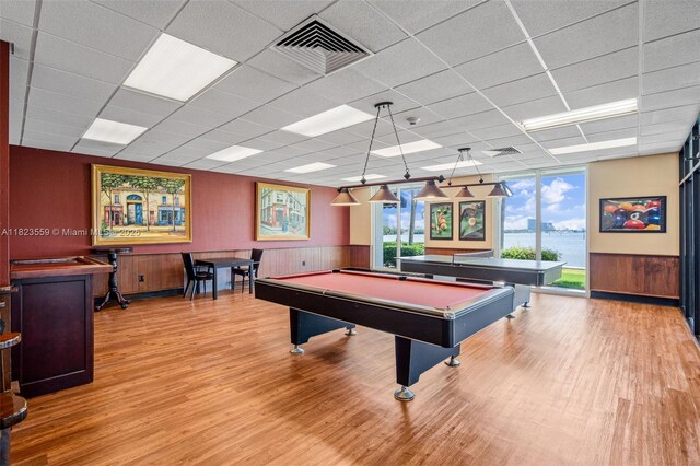 500 Bayview Dr Unit 228, Sunny Isles Beach, FL 33160 - rec room with wood finished floors, billiards, a paneled ceiling, and wainscoting