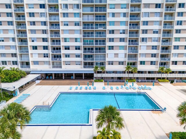500 Bayview Dr Unit 228, Sunny Isles Beach, FL 33160 - community pool with a patio area