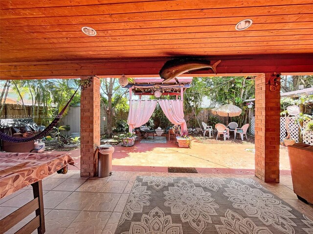 18003 SW 153rd Pl, Miami, FL 33187 - fenced backyard with outdoor dining area and a patio