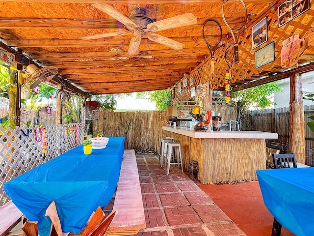 18003 SW 153rd Pl, Miami, FL 33187 - fenced backyard with ceiling fan and a patio area