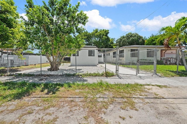 7525 NW 15th Ave, Miami, FL 33147 - back of house featuring a gate