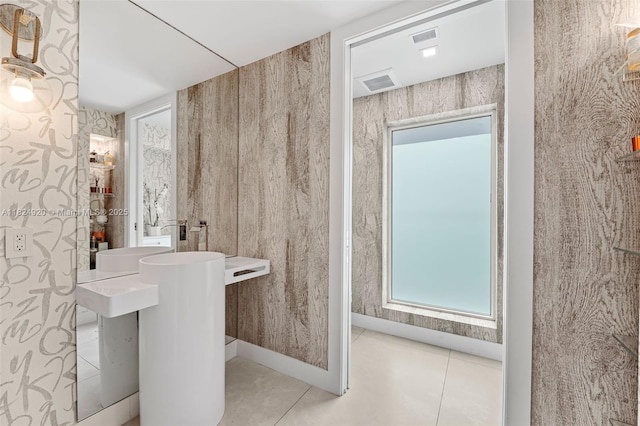 3748 Prairie Ave, Miami Beach, FL 33140 - bathroom with tile patterned floors and plenty of natural light