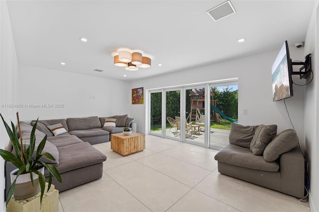 3748 Prairie Ave, Miami Beach, FL 33140 - living area with light tile patterned floors and recessed lighting