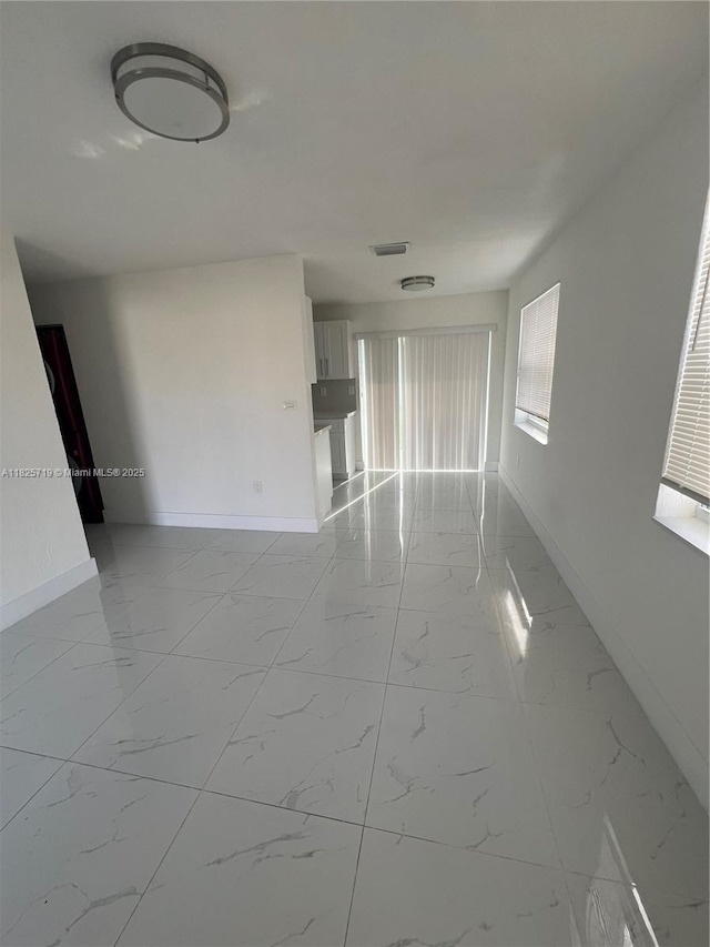 14730 SW 104th Ct, Miami, FL 33176 - unfurnished room with baseboards and light marble finish floors