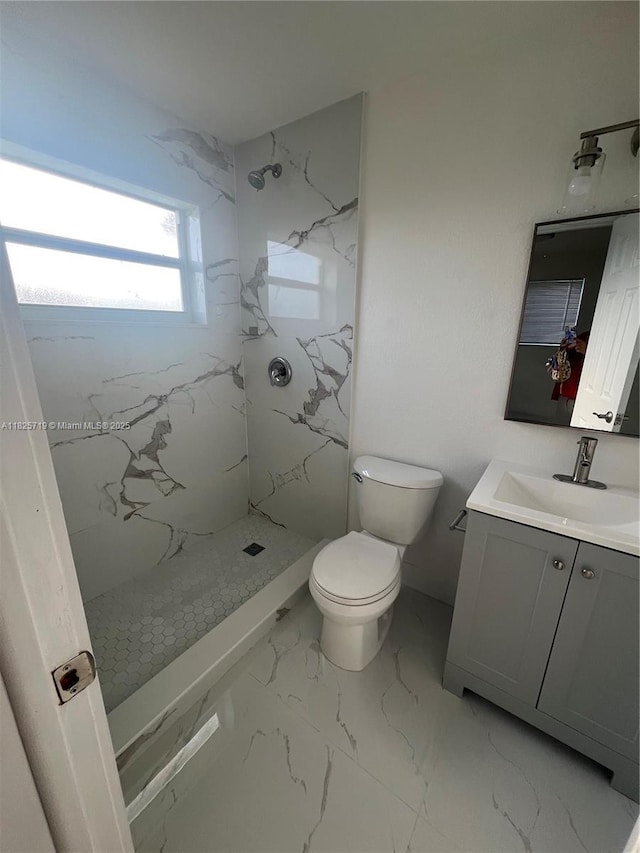14730 SW 104th Ct, Miami, FL 33176 - bathroom with vanity, marble finish floors, and a marble finish shower
