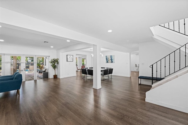 413 Holiday, Hallandale Beach, FL 33009 - living area with stairs, healthy amount of natural light, french doors, recessed lighting, and dark wood-style flooring