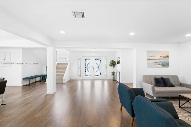 413 Holiday, Hallandale Beach, FL 33009 - living area with stairs, crown molding, recessed lighting, wood finished floors, and french doors