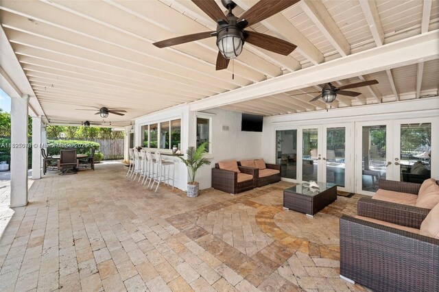 413 Holiday, Hallandale Beach, FL 33009 - view of patio / terrace with french doors, ceiling fan, and outdoor lounge area
