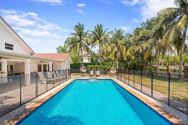 413 Holiday, Hallandale Beach, FL 33009 - view of pool featuring a ceiling fan, a patio, and french doors