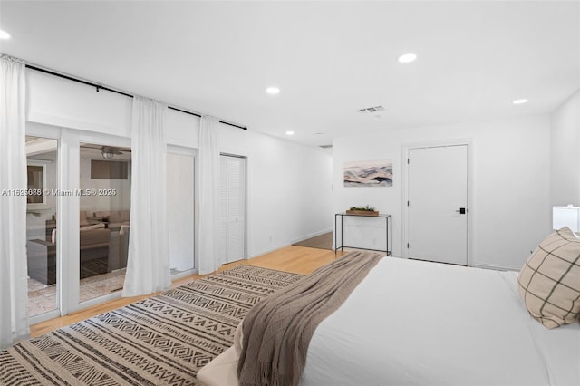 413 Holiday, Hallandale Beach, FL 33009 - bedroom featuring wood finished floors and recessed lighting