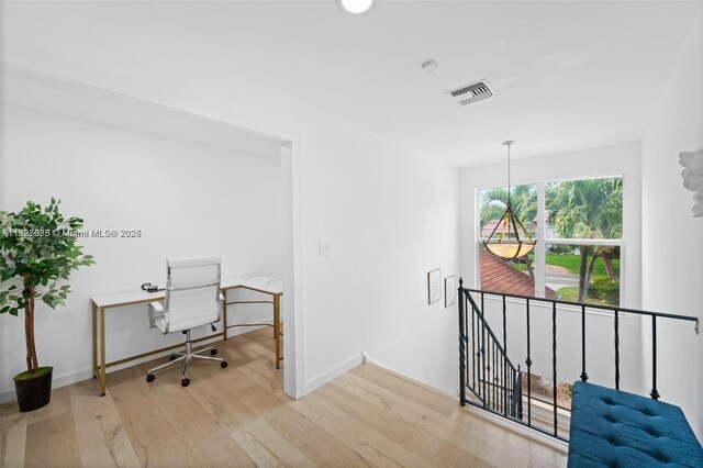 413 Holiday, Hallandale Beach, FL 33009 - office area featuring wood finished floors and baseboards