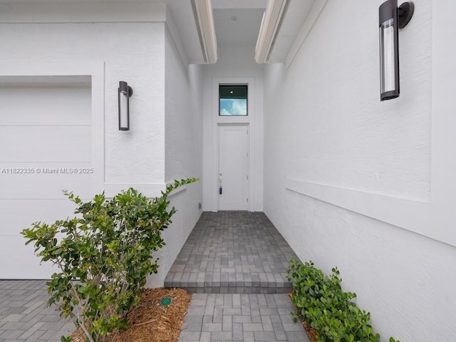 9125 SW Esule Way, Port St Lucie, FL 34987 - entrance to property featuring stucco siding