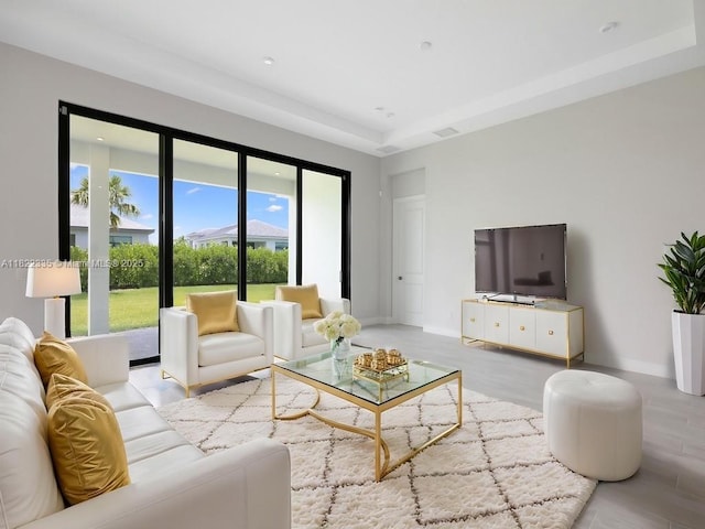 9125 SW Esule Way, Port St Lucie, FL 34987 - living room with baseboards and wood finished floors