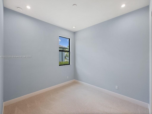 9125 SW Esule Way, Port St Lucie, FL 34987 - carpeted spare room with recessed lighting