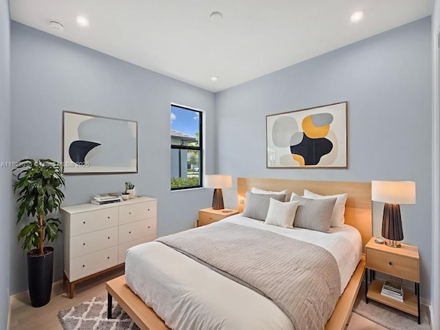 9125 SW Esule Way, Port St Lucie, FL 34987 - bedroom with light wood-type flooring and recessed lighting