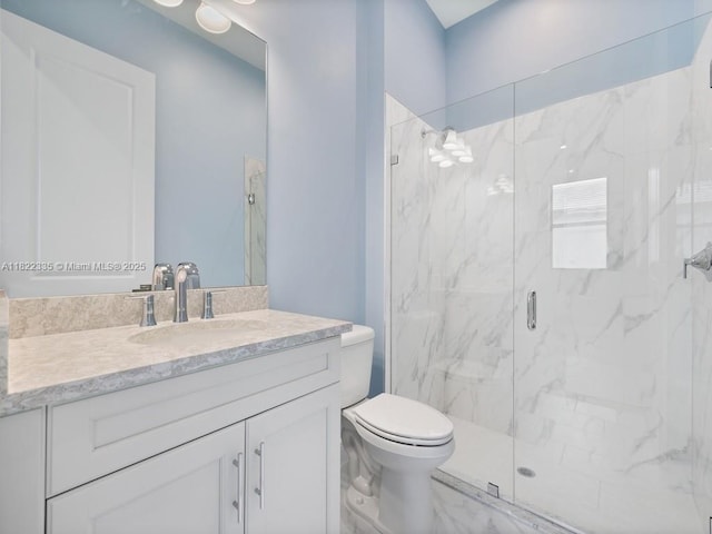 9125 SW Esule Way, Port St Lucie, FL 34987 - bathroom featuring marble look tiles, a marble finish shower, and vanity