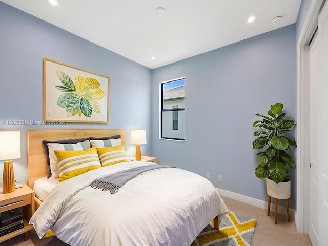 9125 SW Esule Way, Port St Lucie, FL 34987 - carpeted bedroom featuring baseboards