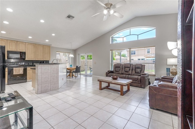 13224 NW 12th St, Pembroke Pines, FL 33028 - living area with recessed lighting, ceiling fan, light tile patterned floors, high vaulted ceiling, and french doors