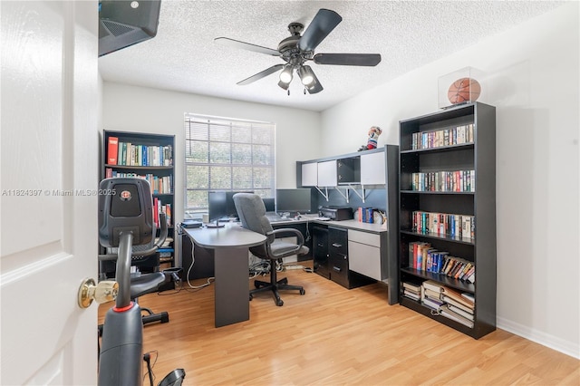 13224 NW 12th St, Pembroke Pines, FL 33028 - office area featuring light wood-style flooring, ceiling fan, and a textured ceiling