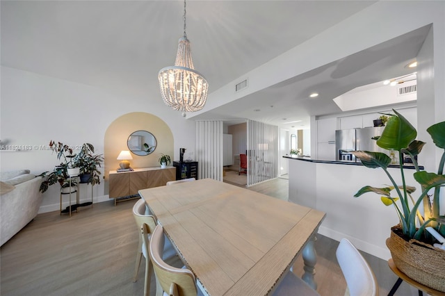 15051 Royal Oaks Ln Unit 1901, North Miami, FL 33181 - dining space featuring a chandelier, light wood finished floors, and recessed lighting