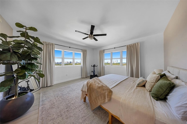 15051 Royal Oaks Ln Unit 1901, North Miami, FL 33181 - bedroom featuring wood finished floors and ceiling fan
