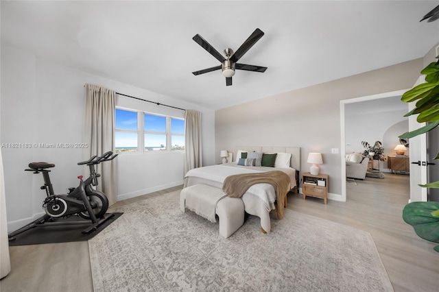 15051 Royal Oaks Ln Unit 1901, North Miami, FL 33181 - bedroom featuring wood finished floors and a ceiling fan