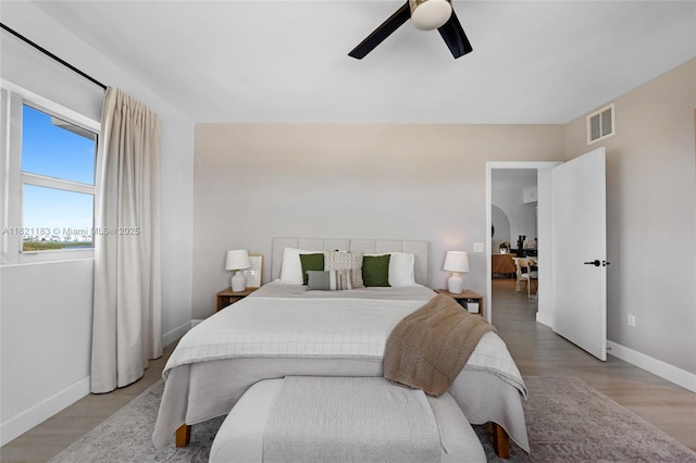 15051 Royal Oaks Ln Unit 1901, North Miami, FL 33181 - bedroom featuring ceiling fan and light wood-style floors