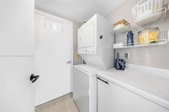 15051 Royal Oaks Ln Unit 1901, North Miami, FL 33181 - laundry area featuring stacked washing machine and dryer
