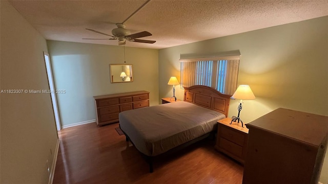 7680 NW 1st St Unit 107, Margate, FL 33063 - bedroom with wood finished floors, ceiling fan, and a textured ceiling
