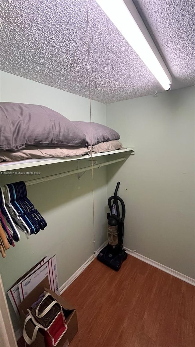 7680 NW 1st St Unit 107, Margate, FL 33063 - spacious closet with wood finished floors
