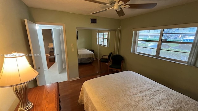 7680 NW 1st St Unit 107, Margate, FL 33063 - bedroom featuring a closet, ceiling fan, and wood finished floors
