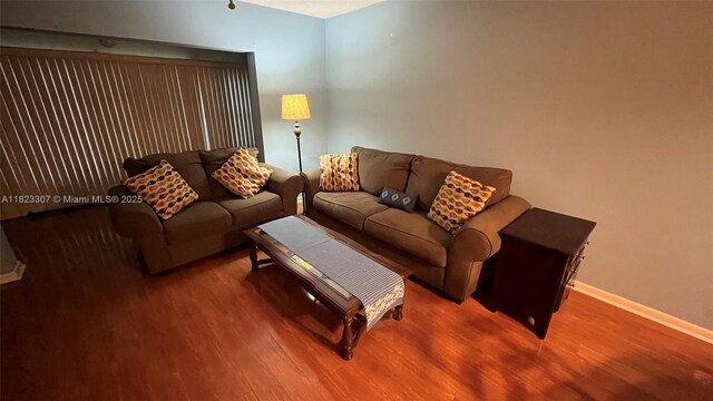 7680 NW 1st St Unit 107, Margate, FL 33063 - living room with wood finished floors
