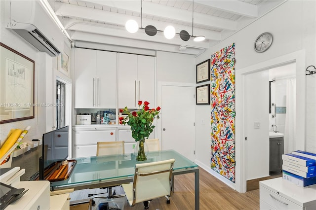 1301 Milan Ave Unit 5, Coral Gables, FL 33134 - dining room with light wood-style floors, beam ceiling, and a wall mounted AC
