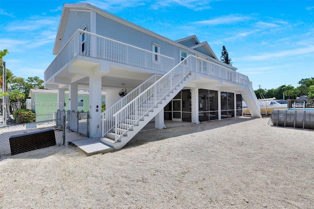 103 Long Key Rd, Key Largo, FL 33037 - rear view of house featuring stairway