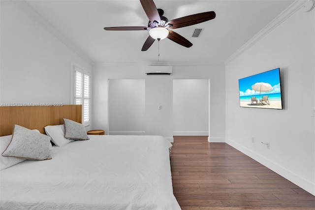 103 Long Key Rd, Key Largo, FL 33037 - bedroom with crown molding, a wall unit AC, wood finished floors, and a ceiling fan