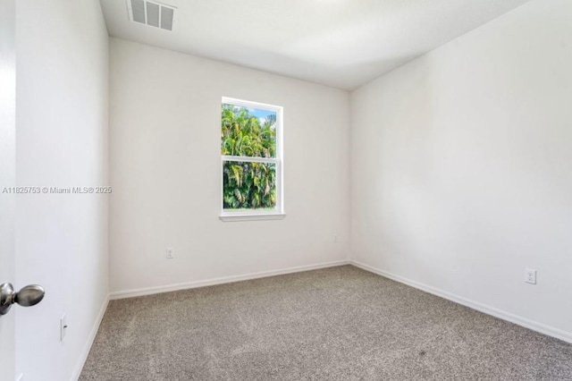 485 SW Molloy St, Port St Lucie, FL 34984 - carpeted spare room with baseboards