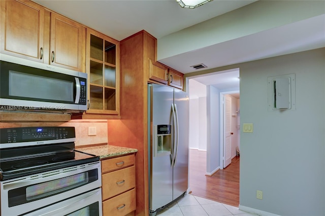 2500 Parkview Dr Unit 405, Hallandale Beach, FL 33009 - hallway with light wood-style flooring and crown molding