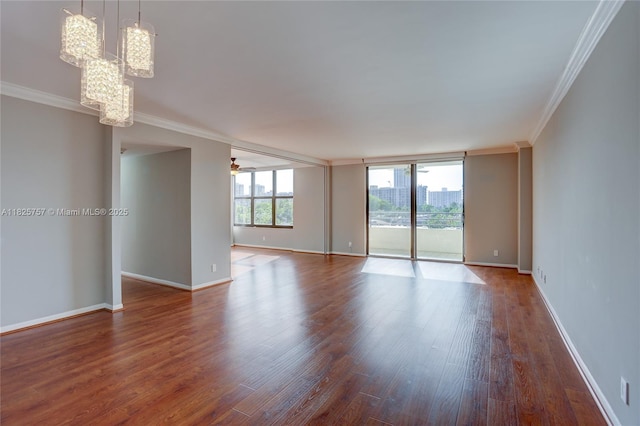 2500 Parkview Dr Unit 405, Hallandale Beach, FL 33009 - unfurnished room with crown molding and wood finished floors