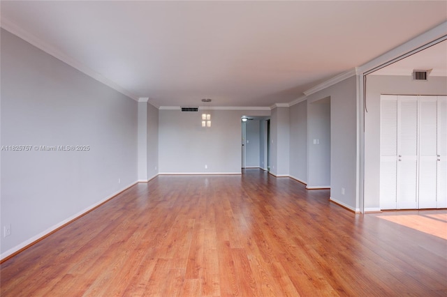 2500 Parkview Dr Unit 405, Hallandale Beach, FL 33009 - unfurnished room with wood finished floors and crown molding
