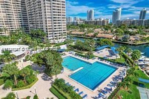 2500 Parkview Dr Unit 405, Hallandale Beach, FL 33009 - view of swimming pool featuring a view of city and a water view