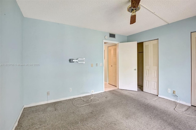 13155 SW 7th Ct Unit 308E, Pembroke Pines, FL 33027 - unfurnished bedroom with carpet flooring, a textured ceiling, and ceiling fan