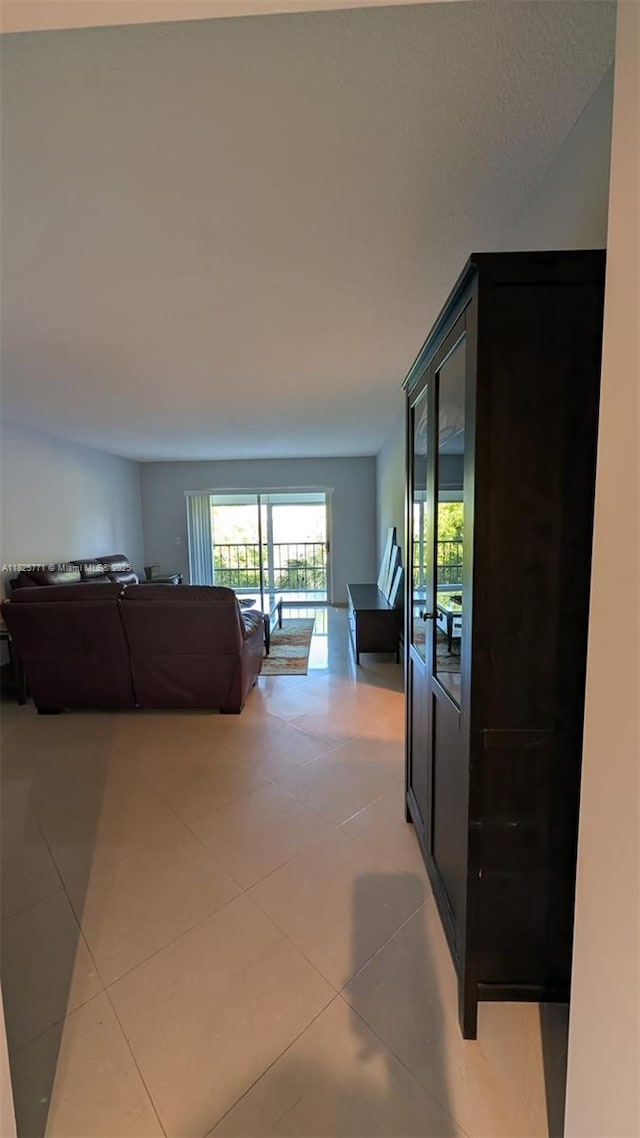 1001 Hillcrest Ct Unit 303, Hollywood, FL 33021 - hallway featuring light tile patterned flooring