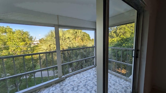 1001 Hillcrest Ct Unit 303, Hollywood, FL 33021 - unfurnished sunroom with plenty of natural light